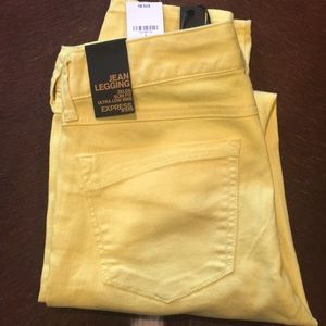 Express yellow skinny jeans